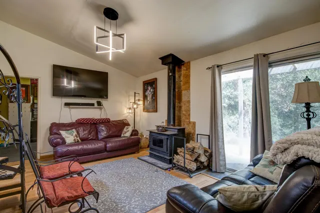 a view of a yard with a tree