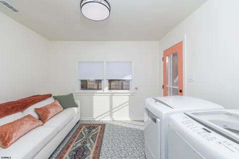 a living room with a couch and a table