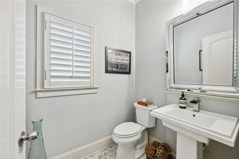 a bathroom with a sink and a toilet