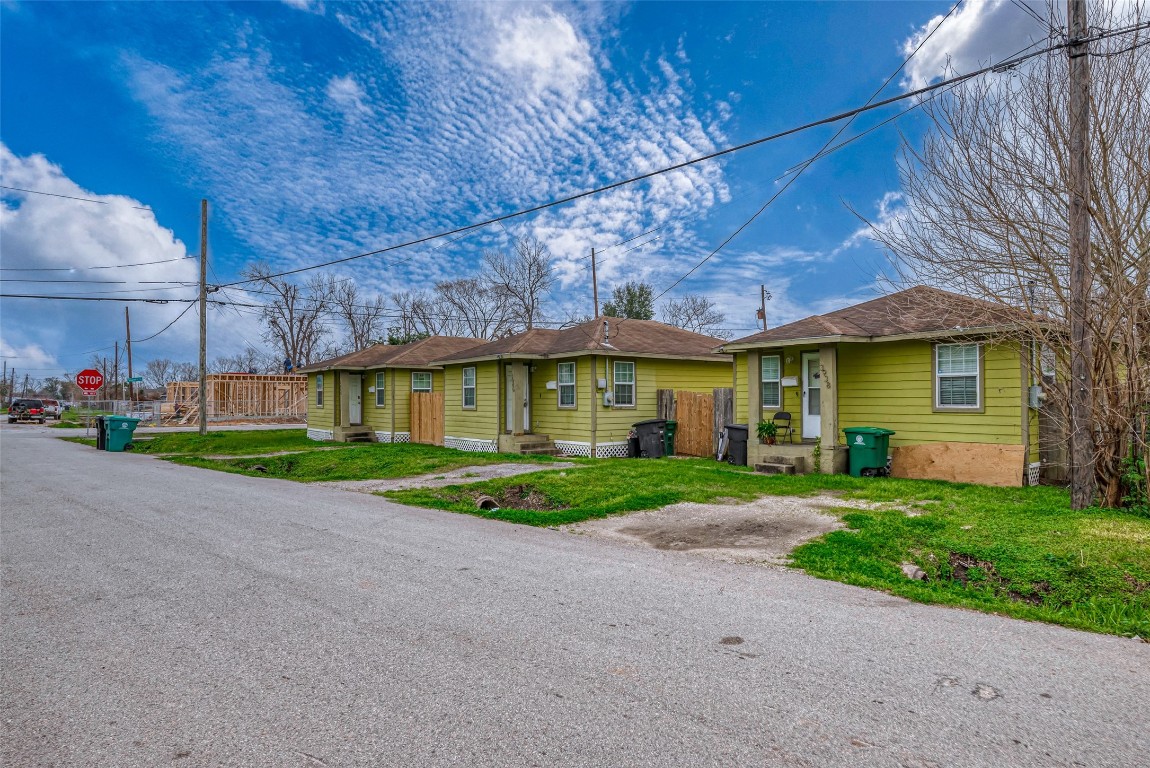 3938 King Street Houston, TX 77026 - Photo 1 of 34 a view of a brick house with a yard