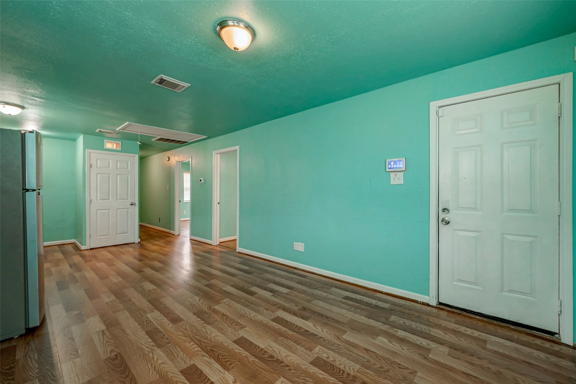 3938 King Street Houston, TX 77026 - Photo 15 of 34 a view of empty room with wooden floor