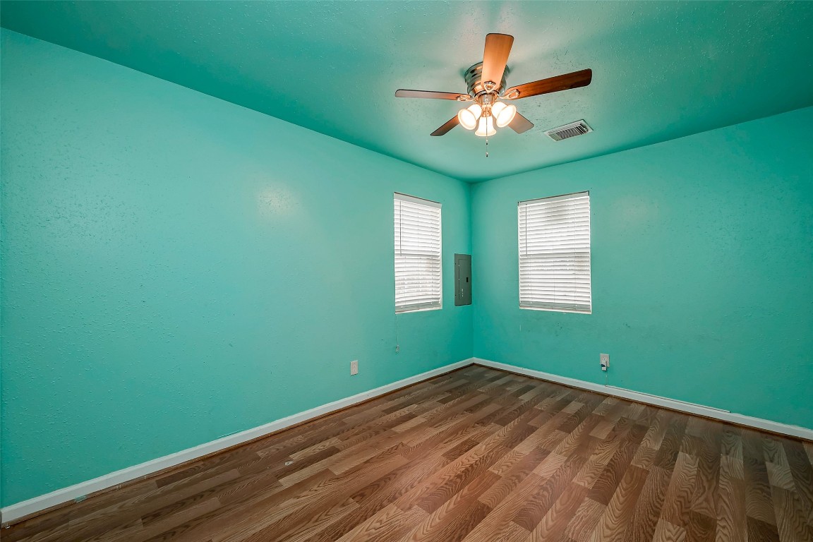 3938 King Street Houston, TX 77026 - Photo 19 of 34 a view of a room with a fan and a window