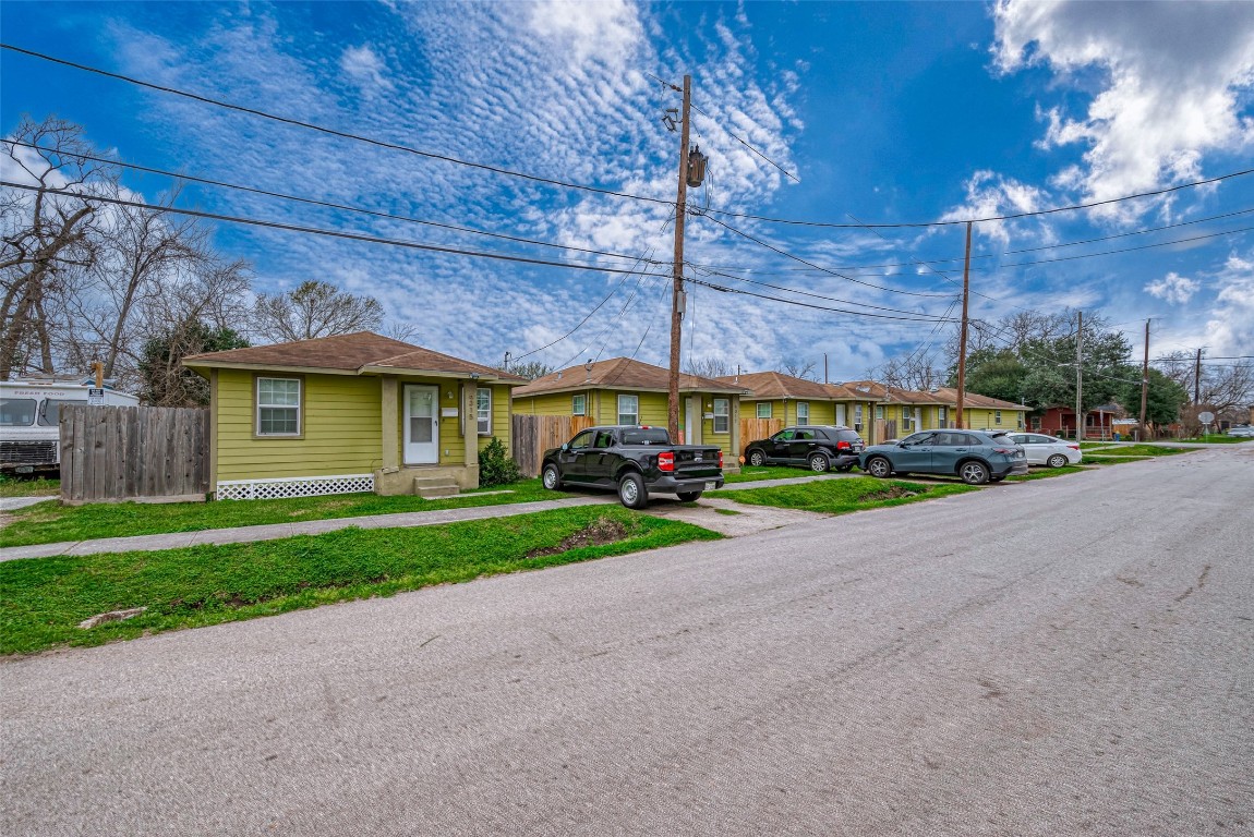 3938 King Street Houston, TX 77026 - Photo 2 of 34 a view of a house with a big yard and potted plants