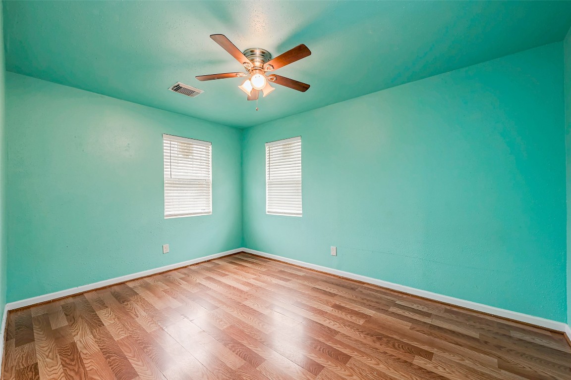 3938 King Street Houston, TX 77026 - Photo 30 of 34 a view of empty room with window and ceiling fan