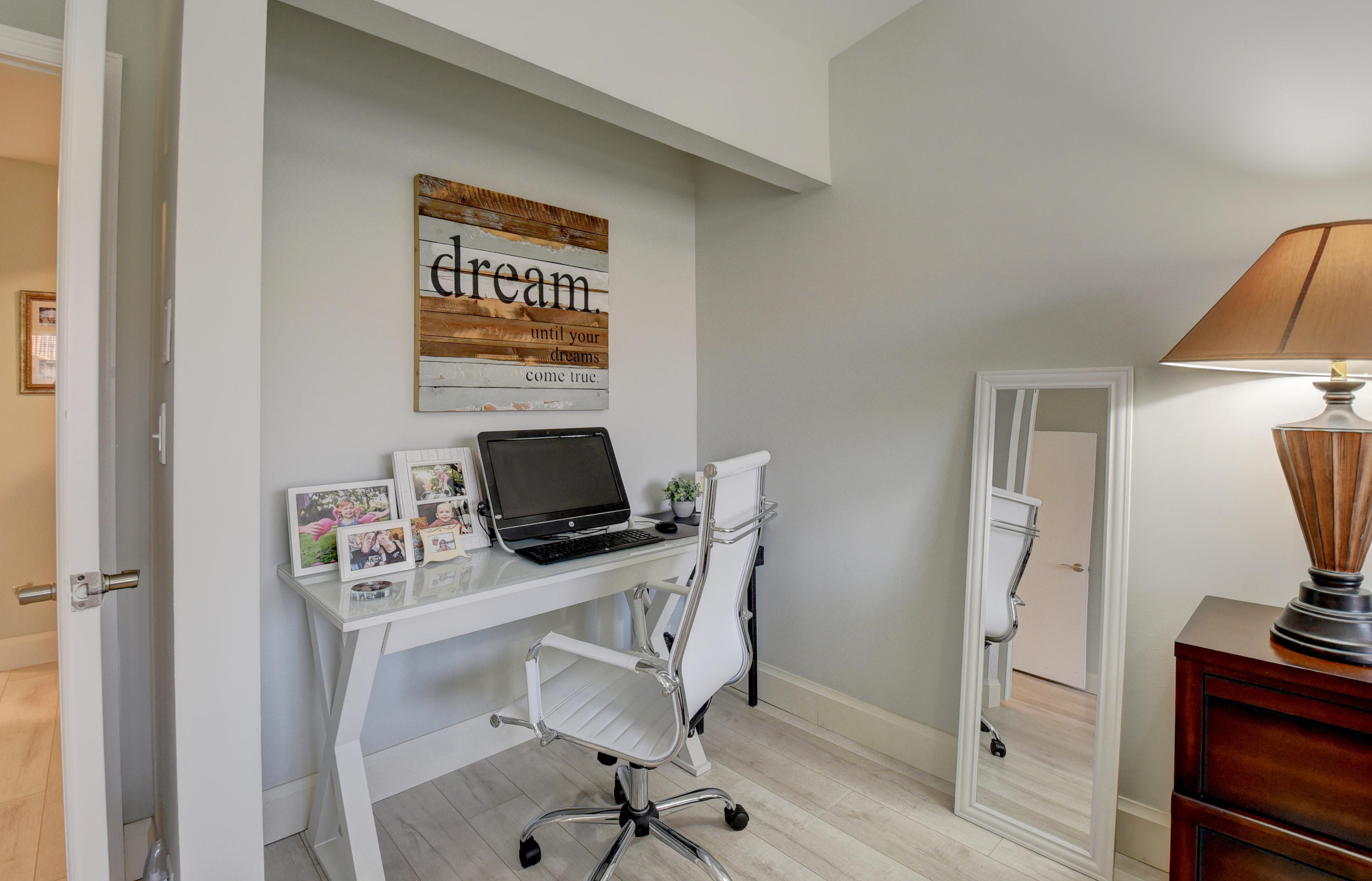 6817 Via Regina Boca Raton, FL 33433 - Photo 22 of 42 a view of workspace with wooden floor windows