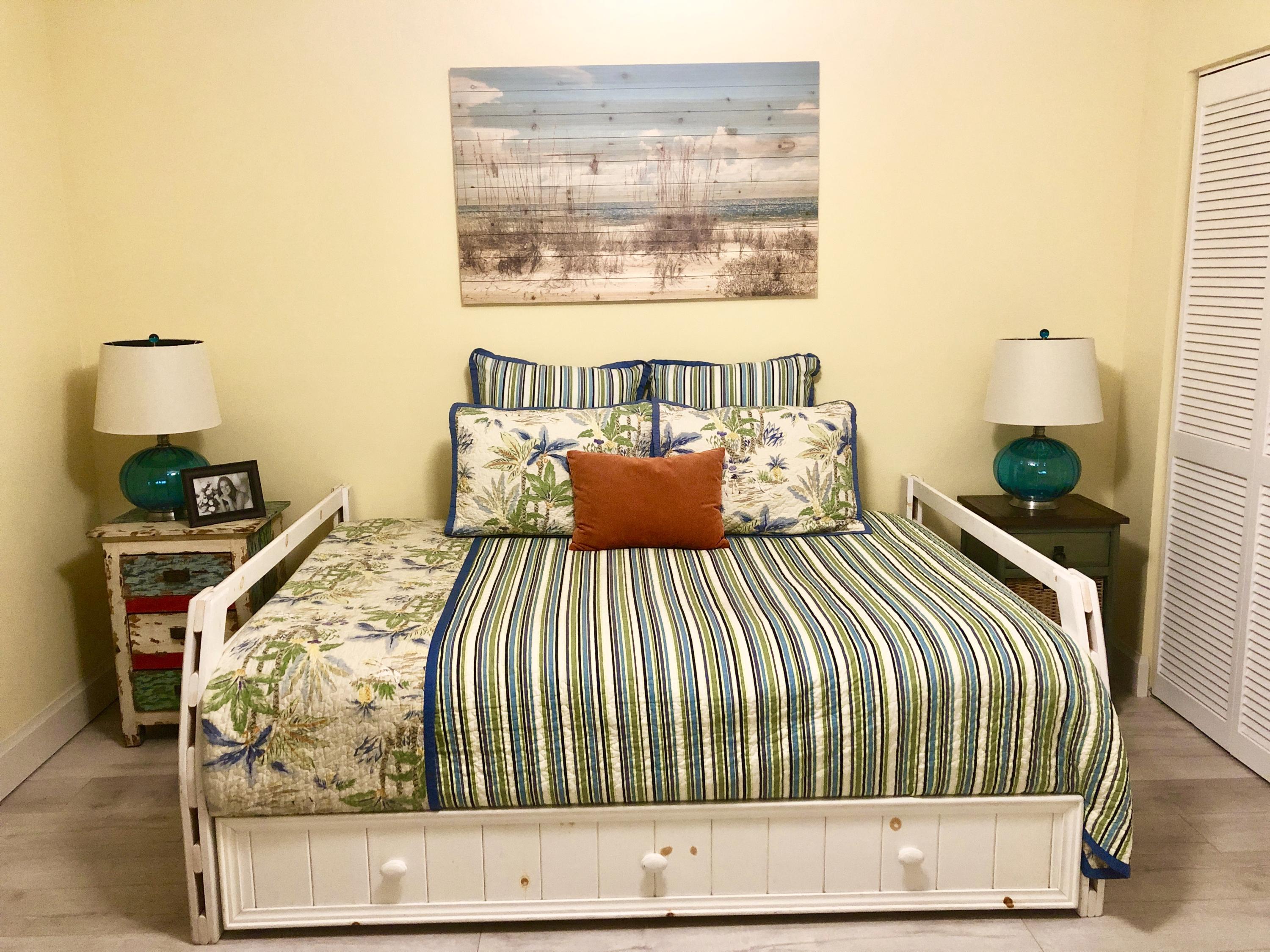 6817 Via Regina Boca Raton, FL 33433 - Photo 25 of 42 a bedroom with a bed and window