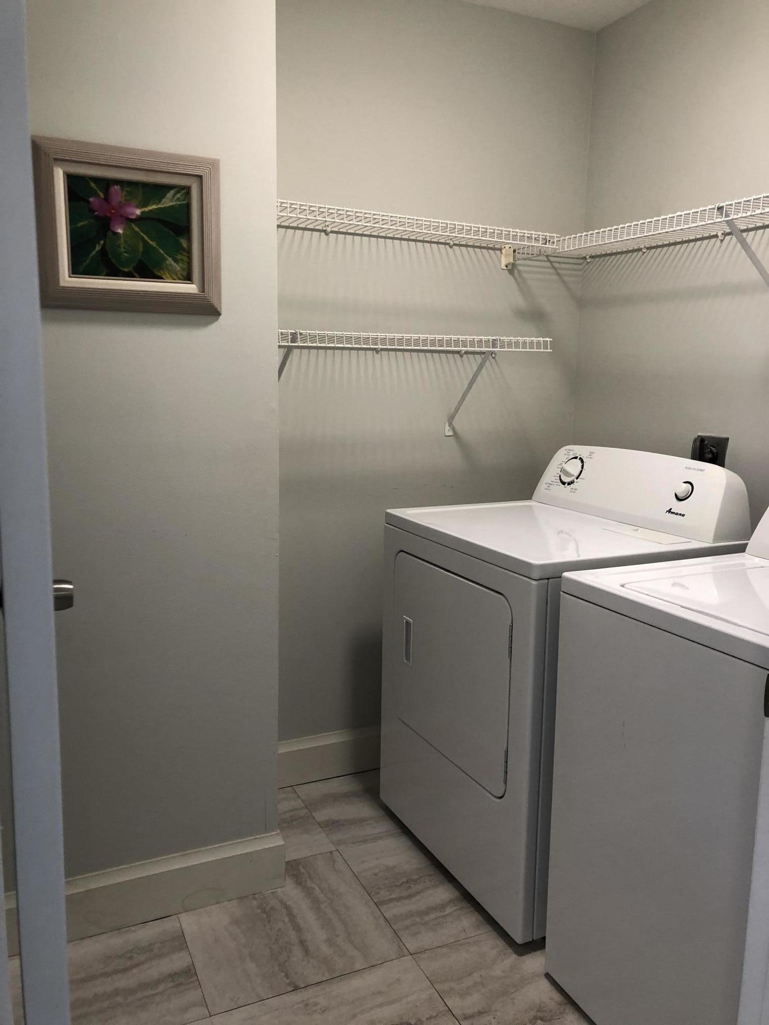 6817 Via Regina Boca Raton, FL 33433 - Photo 30 of 42 a utility room with dryer and washer