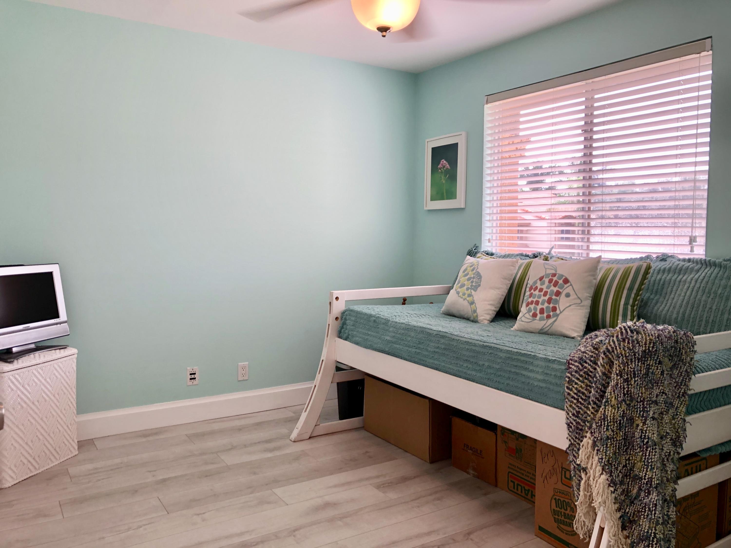 6817 Via Regina Boca Raton, FL 33433 - Photo 31 of 42 a bedroom with a bed and a window