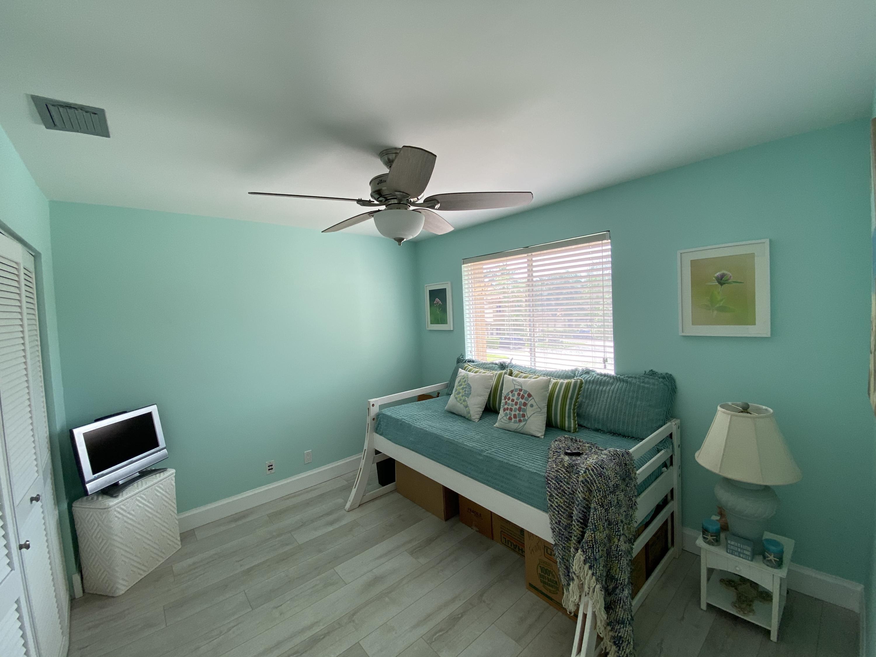 6817 Via Regina Boca Raton, FL 33433 - Photo 32 of 42 a living room with furniture and a window
