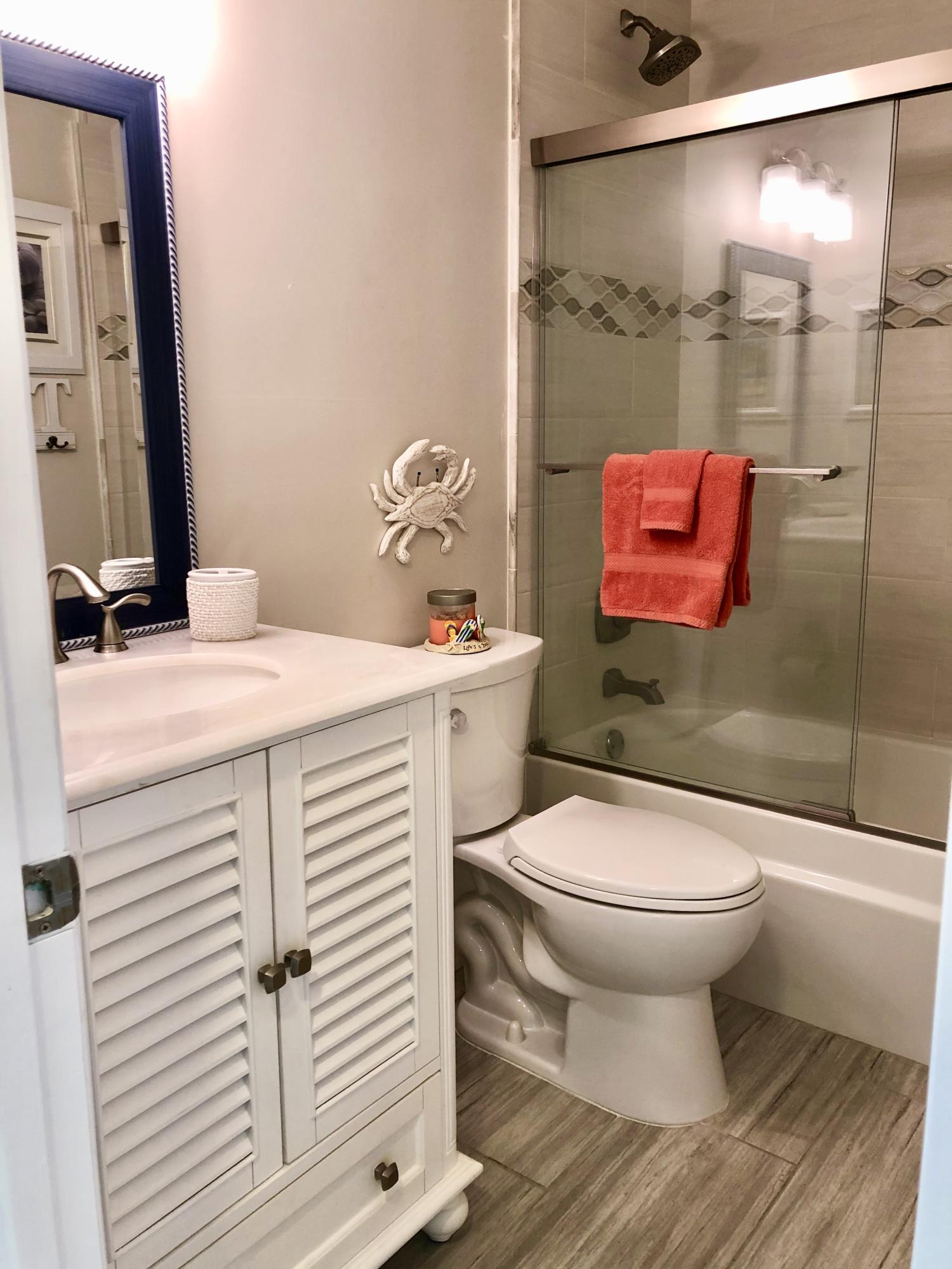 6817 Via Regina Boca Raton, FL 33433 - Photo 34 of 42 a bathroom with a sink toilet and shower