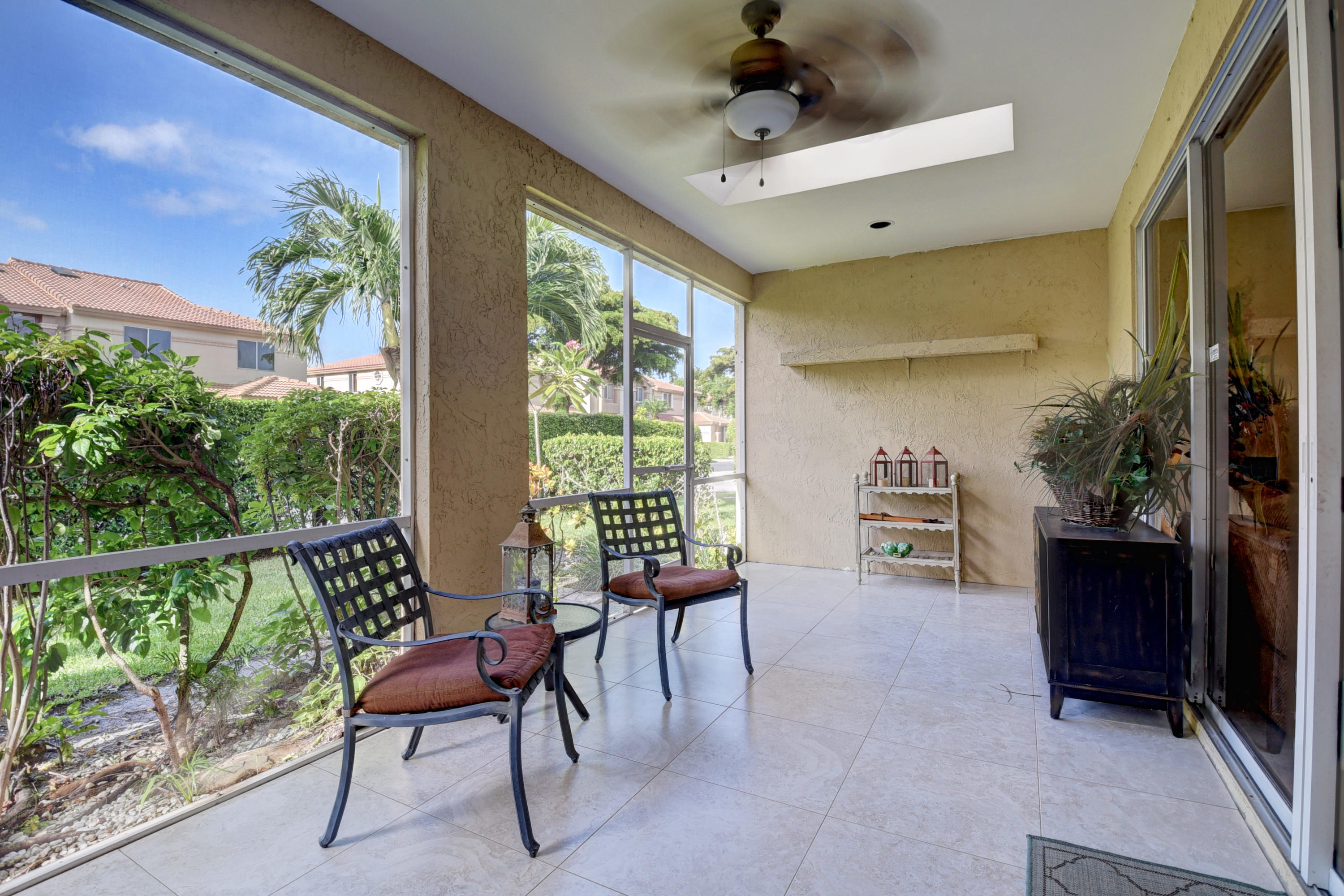6817 Via Regina Boca Raton, FL 33433 - Photo 35 of 42 a view of a chairs and table in a room