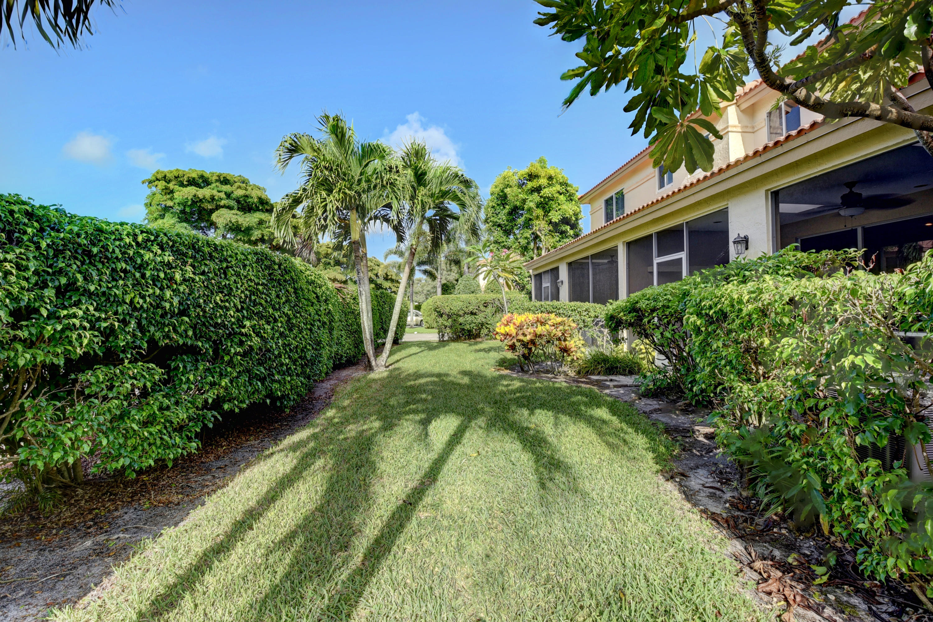 6817 Via Regina Boca Raton, FL 33433 - Photo 41 of 42 a view of a building with a garden