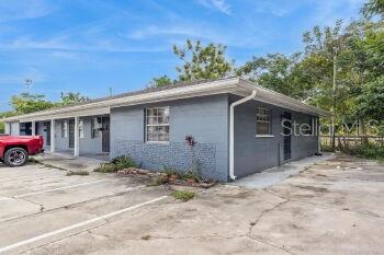 907 Center Avenue, Unit 5 Haines City, FL 33844 - Photo 14 of 15 a view of a house with a patio