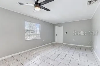 a view of an empty room with window