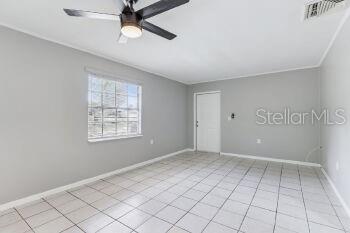 907 Center Avenue, Unit 5 Haines City, FL 33844 - Photo 4 of 15 a view of an empty room with window