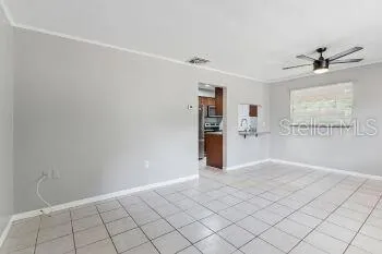 a view of an empty room and window