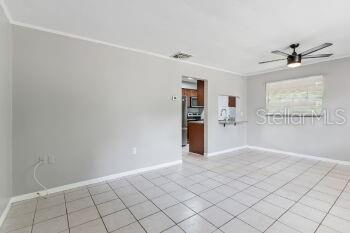 907 Center Avenue, Unit 5 Haines City, FL 33844 - Photo 6 of 15 a view of an empty room and window