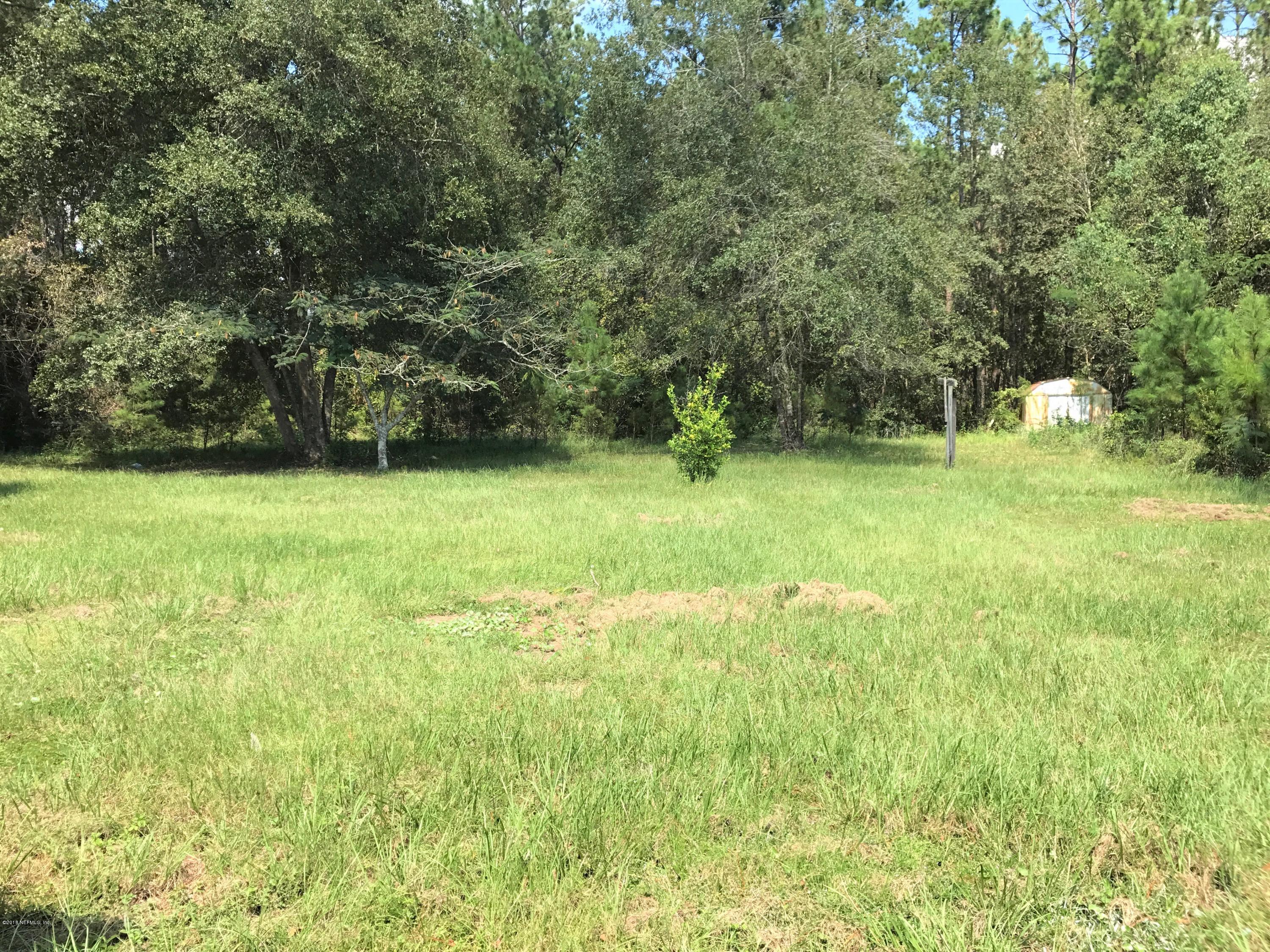5709 North Tall Pine Road Macclenny, FL 32063 - Photo 10 of 10 a view of a field with a trees
