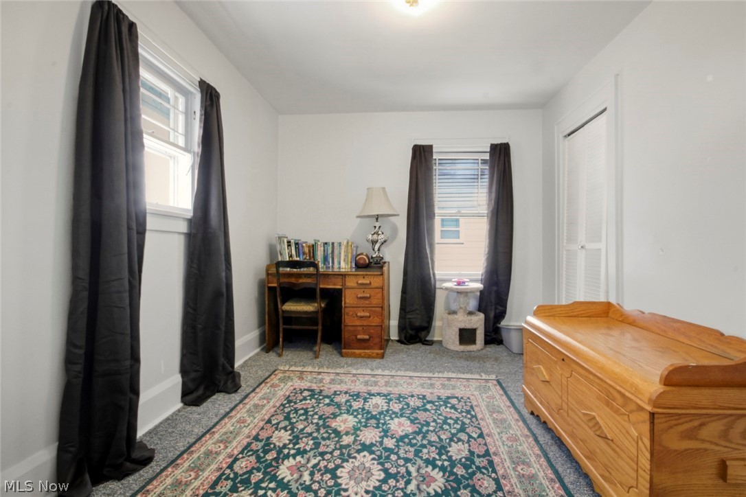 32 Como Street Struthers, OH 44471 - Photo 15 of 22 Bedroom featuring light carpet and baseboards