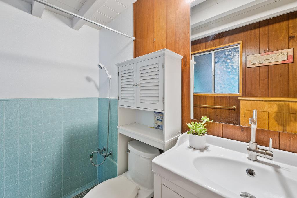 621 Hidden Canyon Watsonville, CA 95076 - Photo 23 of 55 a bathroom with a sink toilet and shower