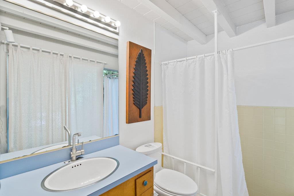 621 Hidden Canyon Watsonville, CA 95076 - Photo 25 of 55 a bathroom with a sink toilet and shower