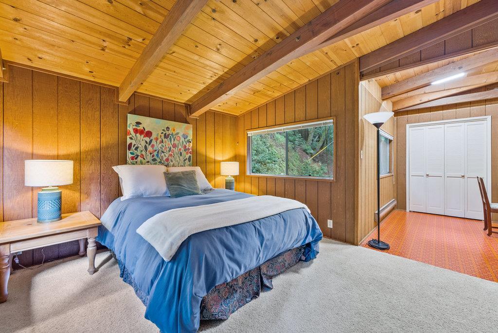 621 Hidden Canyon Watsonville, CA 95076 - Photo 28 of 55 a bedroom with a large bed and a window