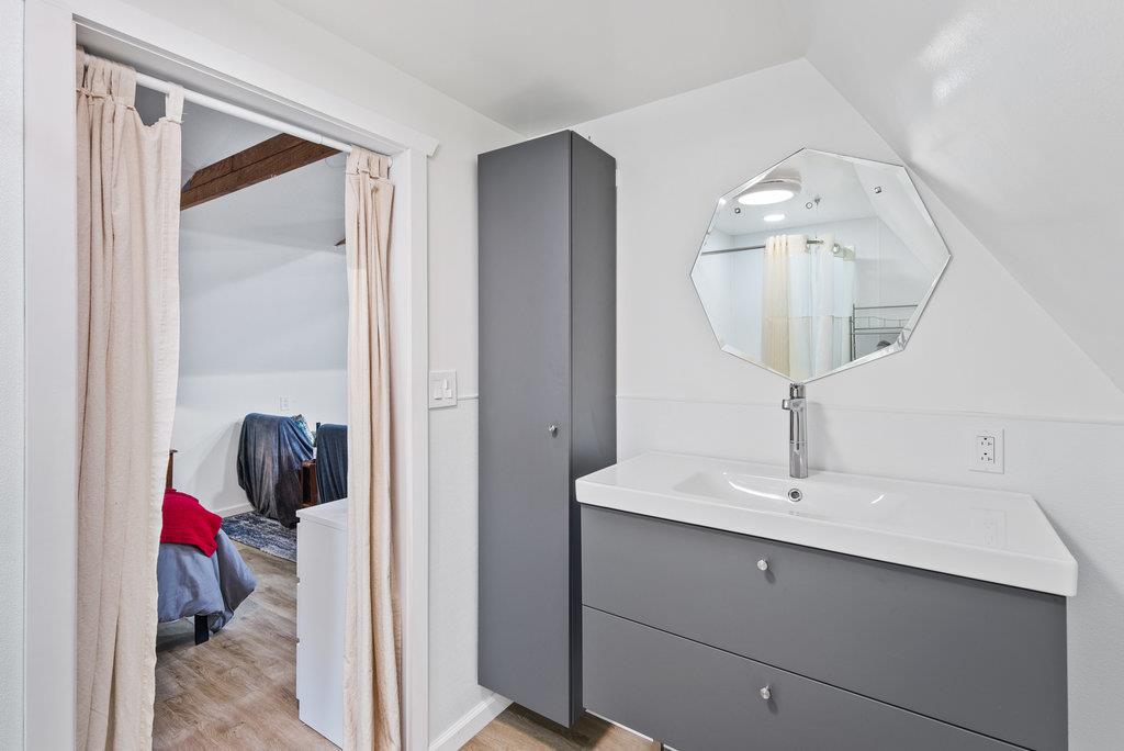 621 Hidden Canyon Watsonville, CA 95076 - Photo 40 of 55 a en suite bathroom with a sink and a mirror