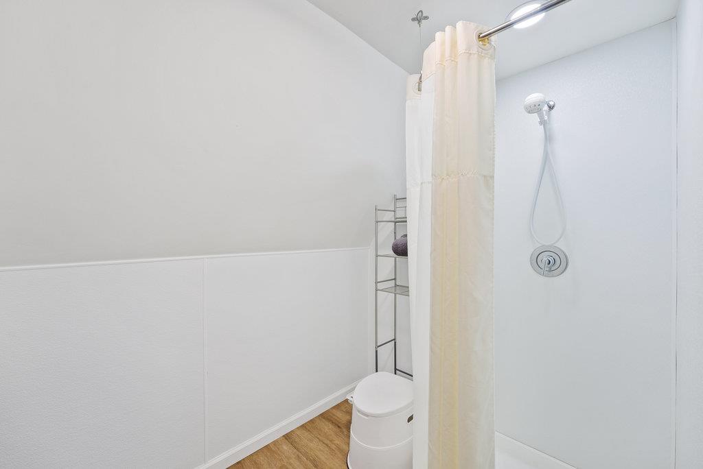 621 Hidden Canyon Watsonville, CA 95076 - Photo 44 of 55 a bathroom with a shower and a toilet