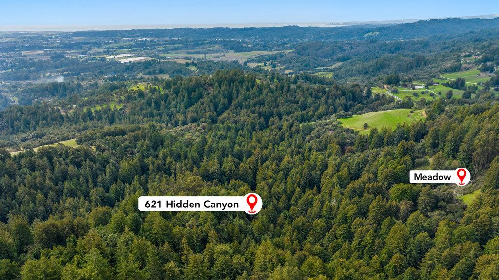 621 Hidden Canyon Watsonville, CA 95076 - Photo 52 of 55 a view of a sign that is sitting in a field