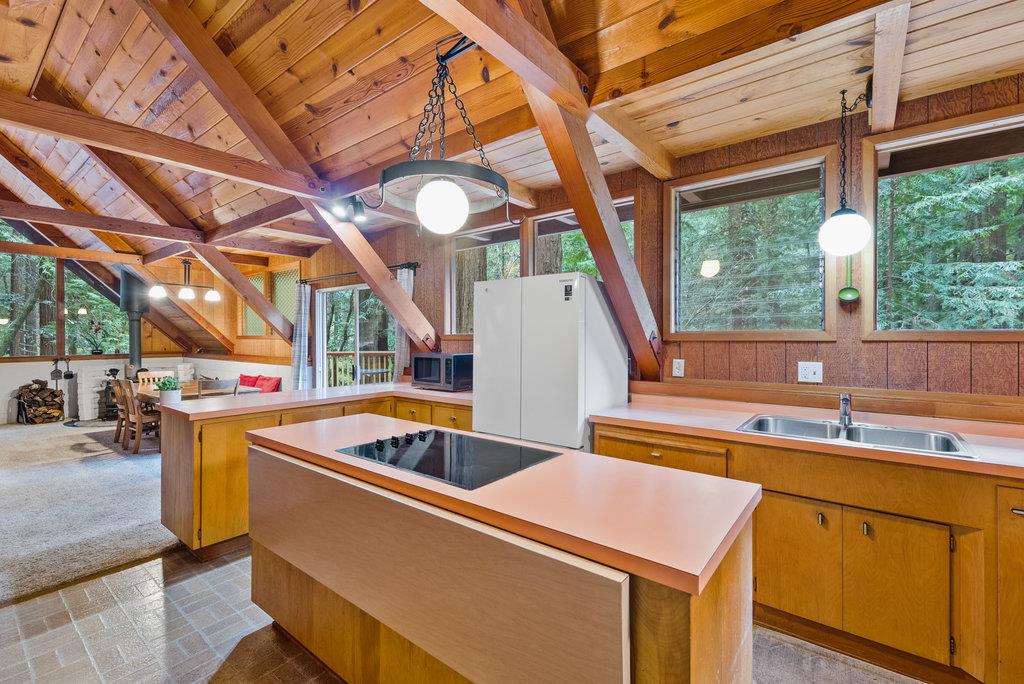 621 Hidden Canyon Watsonville, CA 95076 - Photo 7 of 55 a kitchen that has a sink and a stove