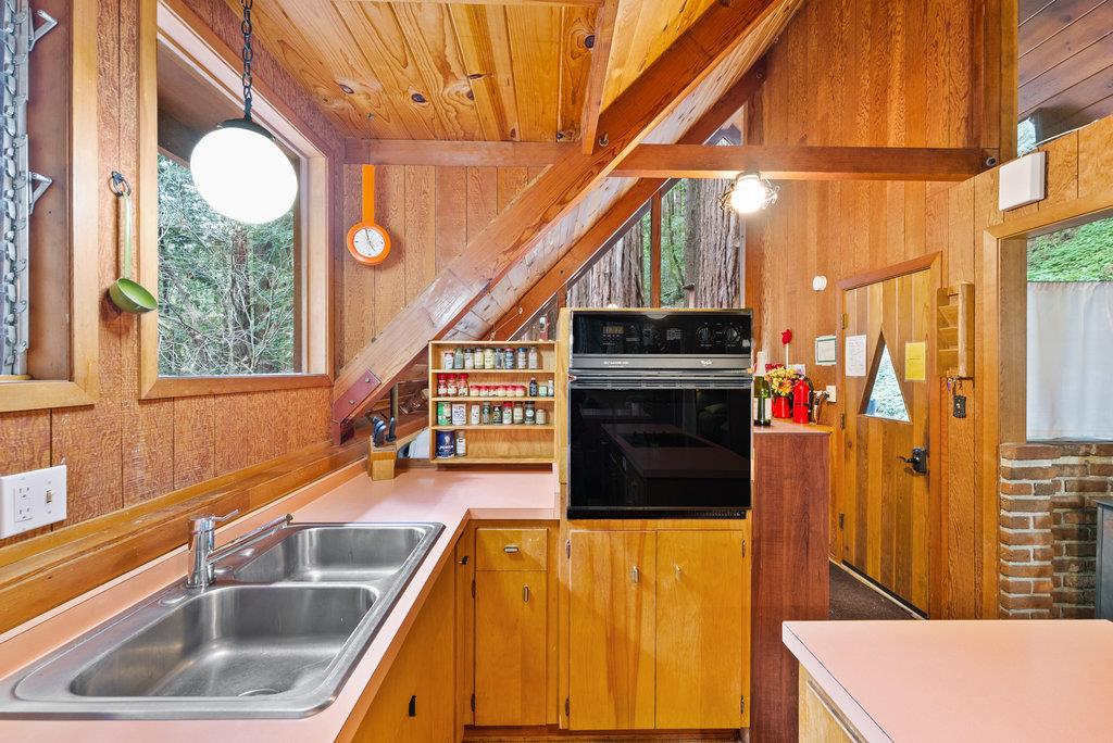621 Hidden Canyon Watsonville, CA 95076 - Photo 9 of 55 a kitchen with stainless steel appliances a sink a stove and a refrigerator