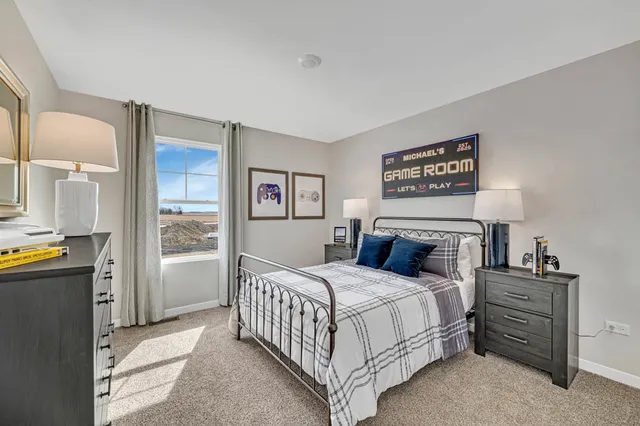 a bedroom with a bed and a cabinets