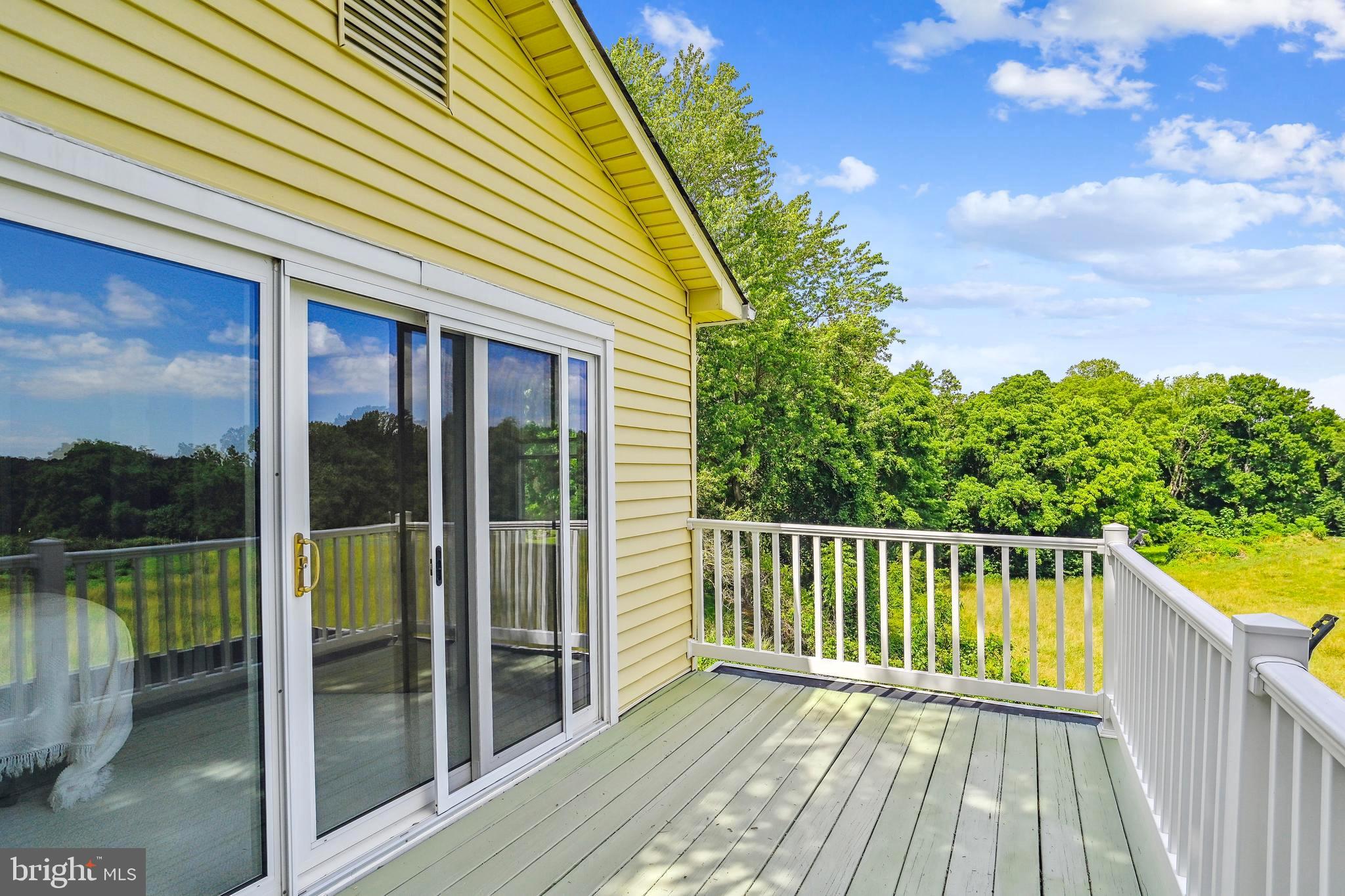 4475 Muddy Creek Road Harwood, MD 20776 - Photo 8 of 59 Upper Level Bedroom Deck with Serene Vistas