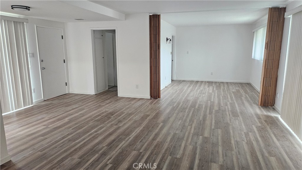 22627 Nadine Circle, Unit B Torrance, CA 90505 - Photo 7 of 16 a view of a room with wooden floor
