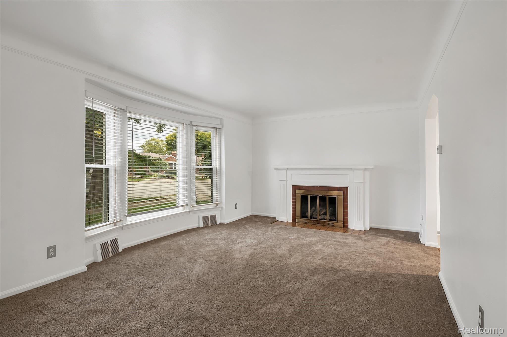 7338 Rosedale Boulevard Allen Park, MI 48101 - Photo 9 of 31 Living room fireplace