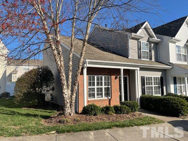 7831 Averette Field Drive Raleigh, NC 27616 - Photo 1 of 20 a front view of a house with garden
