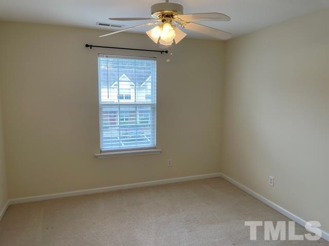 7831 Averette Field Drive Raleigh, NC 27616 - Photo 14 of 20 a view of an empty room with a window