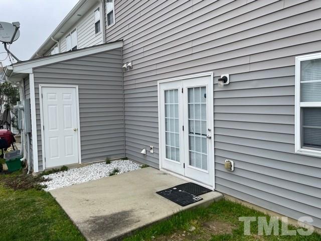 7831 Averette Field Drive Raleigh, NC 27616 - Photo 19 of 20 a front view of a house with a yard