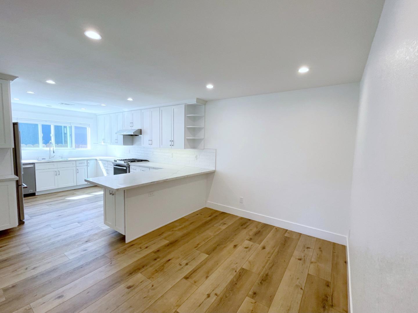 808 Sonia Way Mountain View, CA 94040 - Photo 11 of 20 a view of kitchen and wooden floor