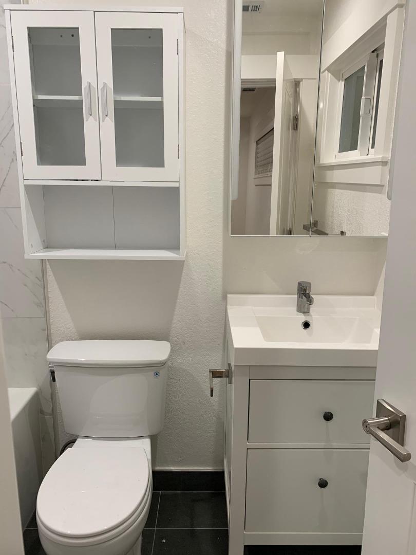 808 Sonia Way Mountain View, CA 94040 - Photo 18 of 20 a bathroom with a toilet sink and mirror