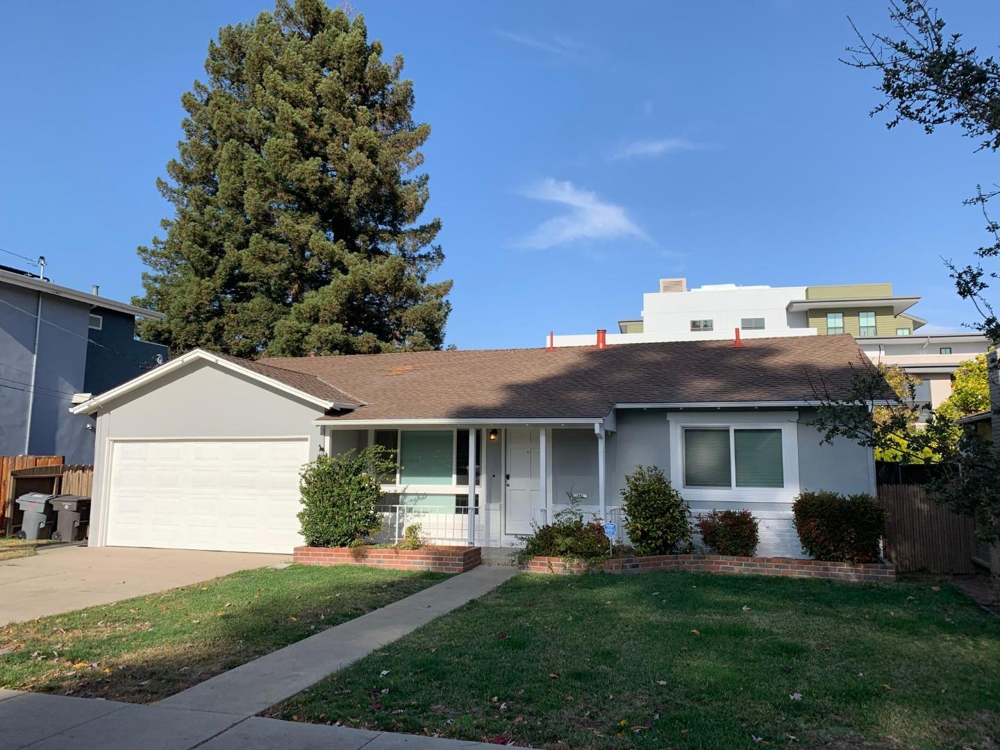 808 Sonia Way Mountain View, CA 94040 - Photo 2 of 20 a front view of a house with a yard and garage
