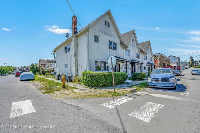 a house with yard in front of it