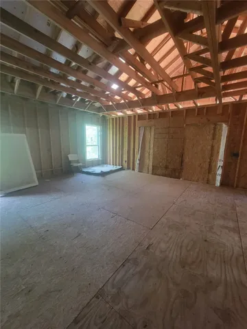 a view of a room with lots of green space