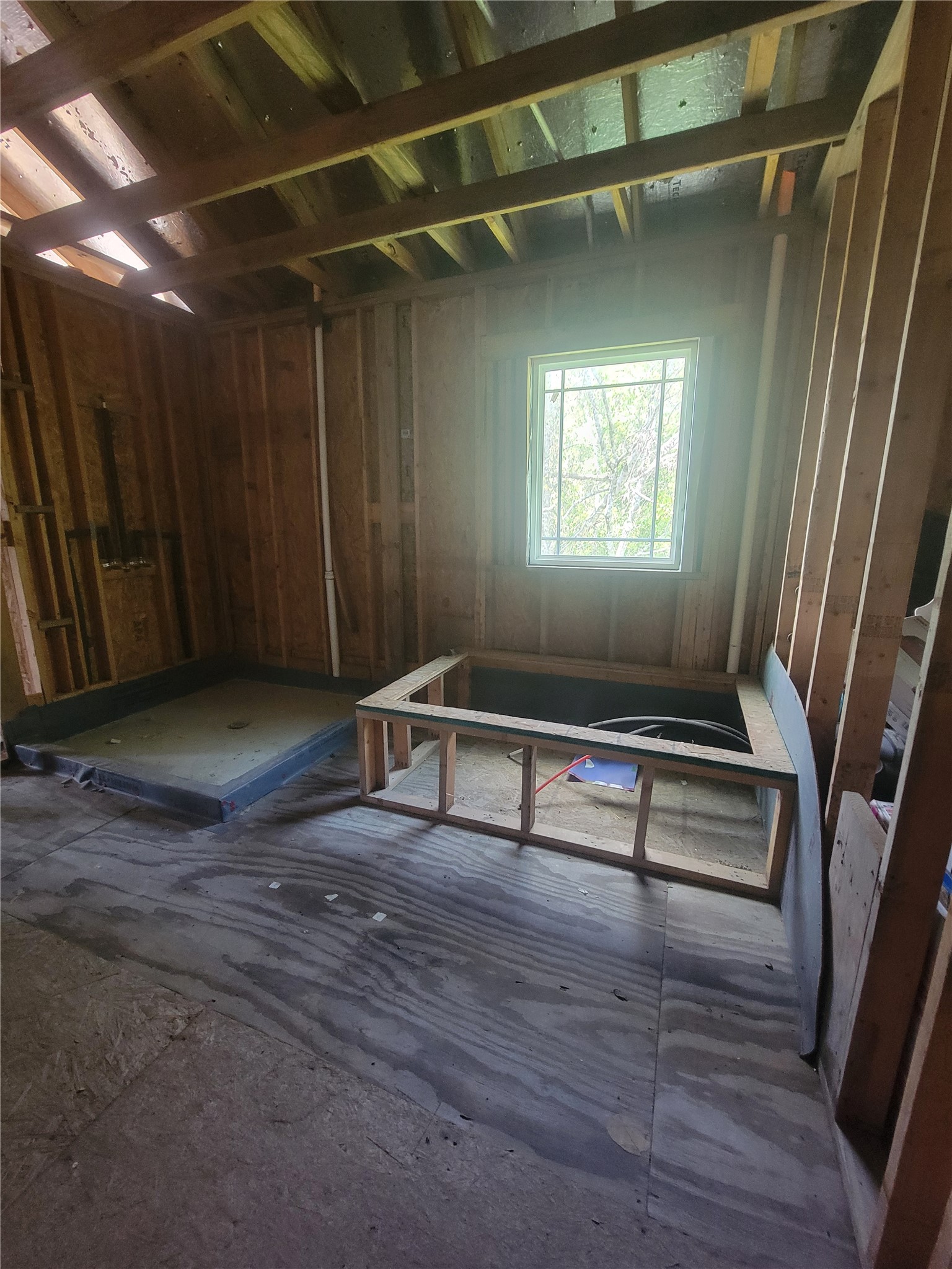 2170 Skrivanek Road Sealy, TX 77474 - Photo 13 of 35 a bench sitting in a room next to a window