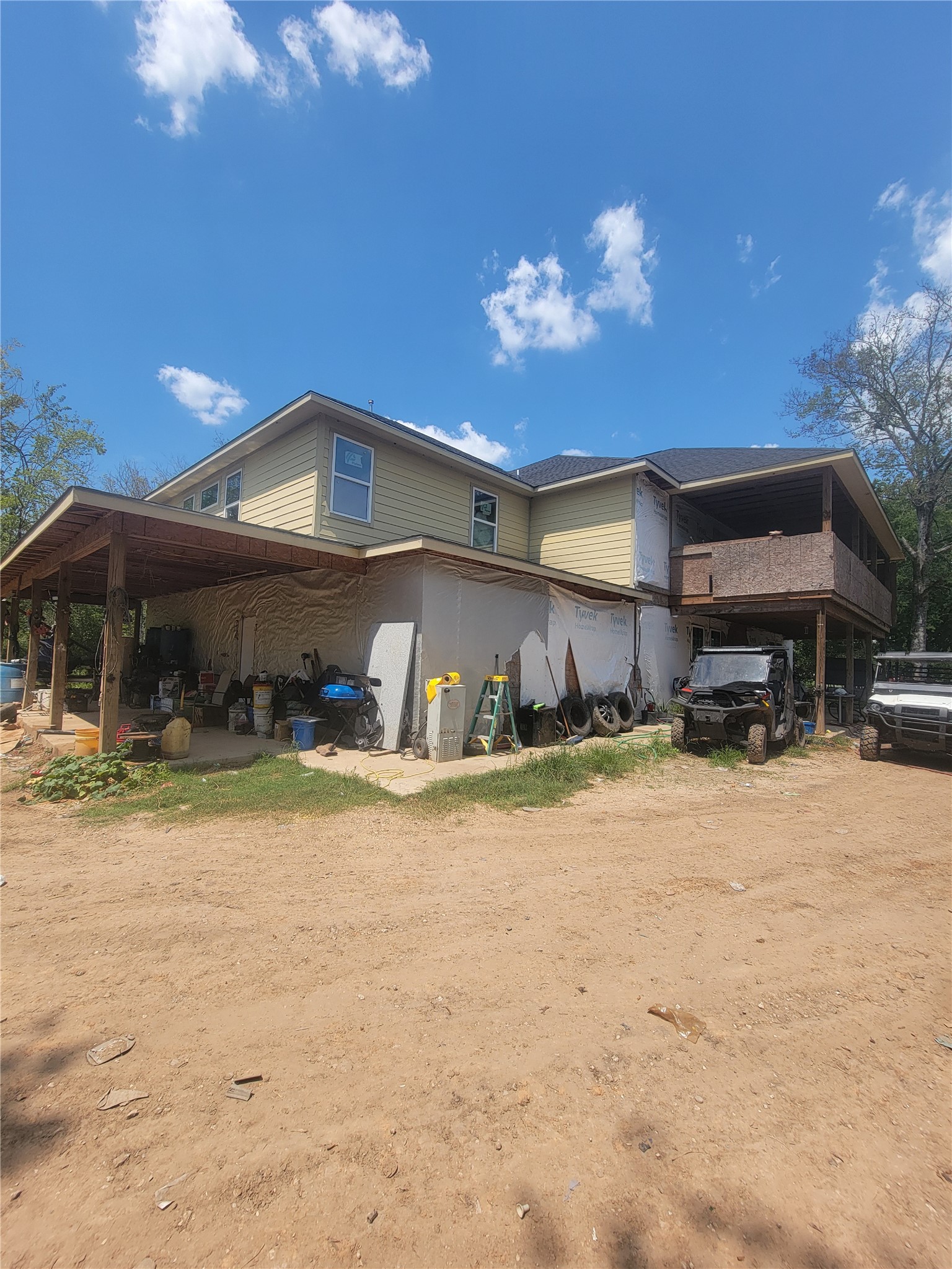 2170 Skrivanek Road Sealy, TX 77474 - Photo 23 of 35 a front view of a house with a yard and a garage