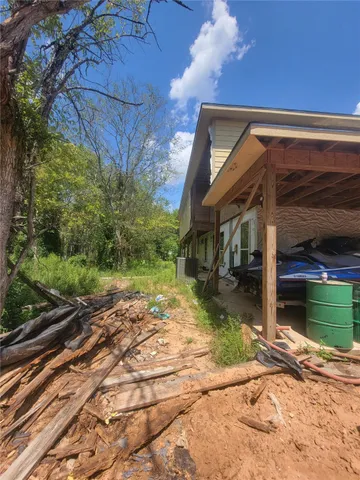 a house view with a backyard space
