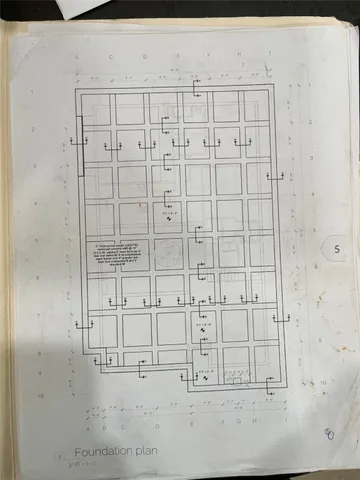 a view of kitchen with cabinets