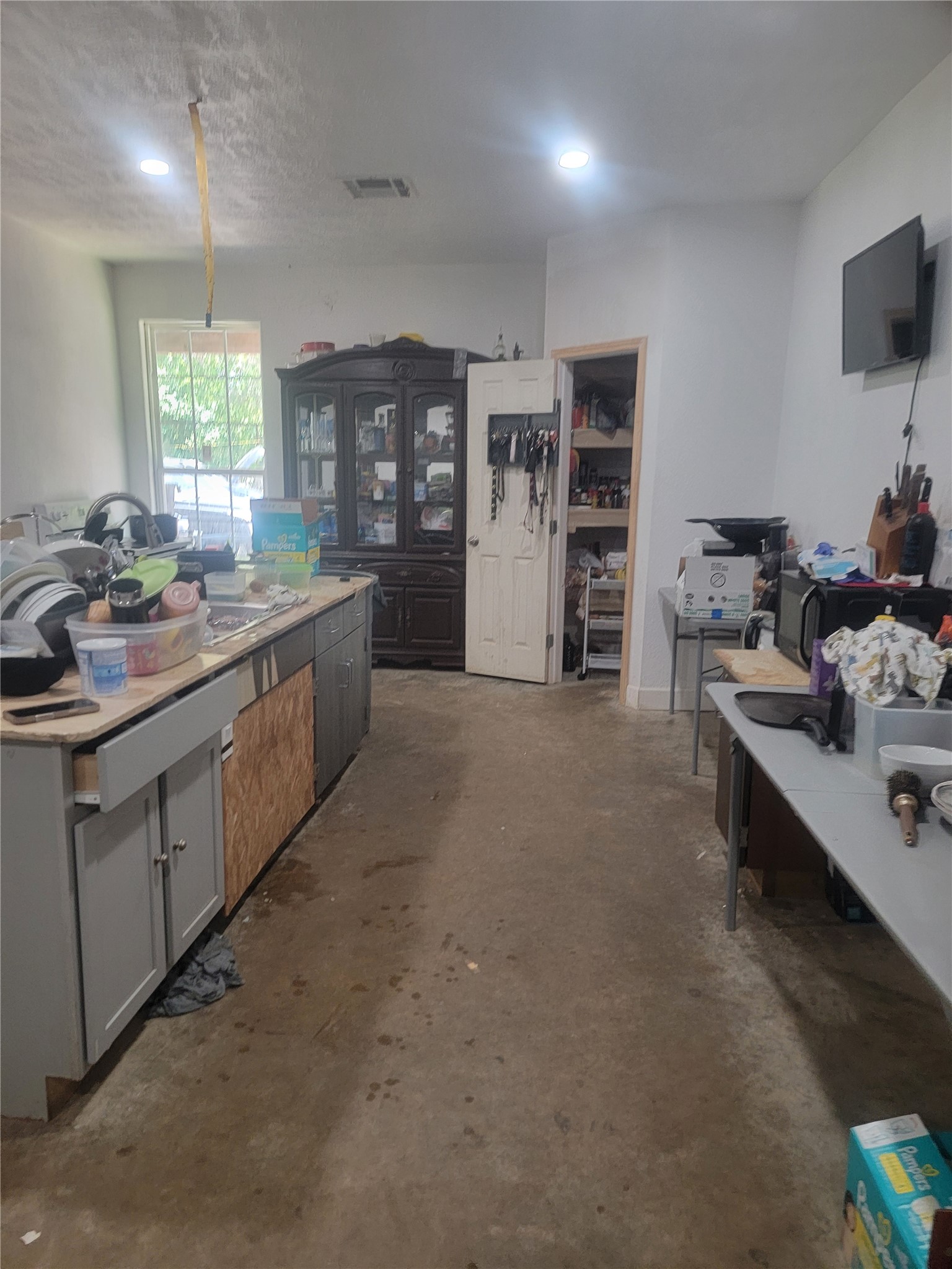 2170 Skrivanek Road Sealy, TX 77474 - Photo 10 of 35 a kitchen with stainless steel appliances granite countertop a sink and cabinets