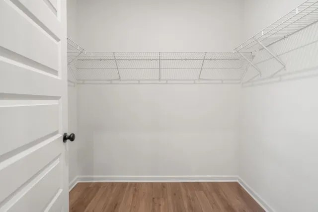 a en suite bathroom with double sink and a mirror