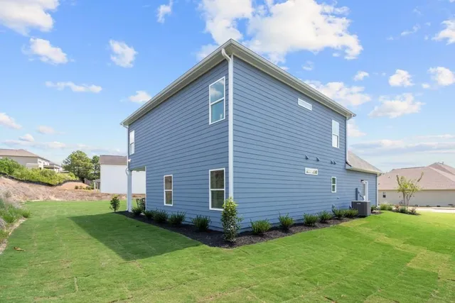 a view of a house with a ocean view